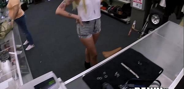  Inked chick bounces on a big dick for some money in pawnshop